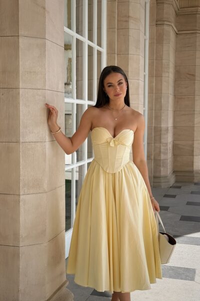 Vestido amarillo maxi con moño