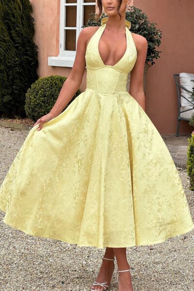 Vestido amarillo vuelo satinado